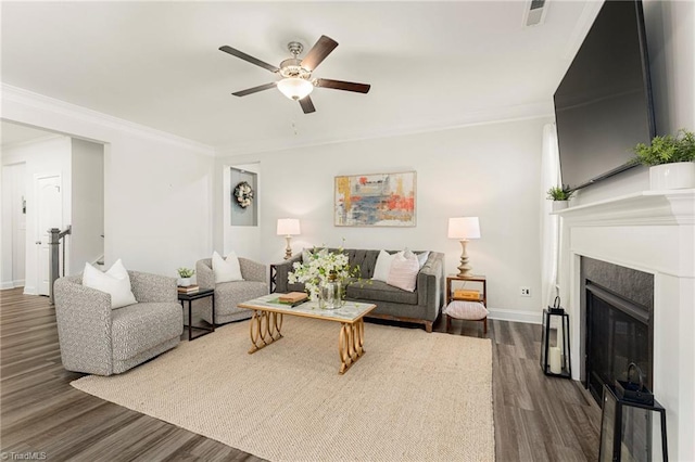 1348 Motsinger Rd, Winston-Salem, NC 27107 - living area featuring visible vents, crown molding, baseboards, ceiling fan, and dark wood-style floors