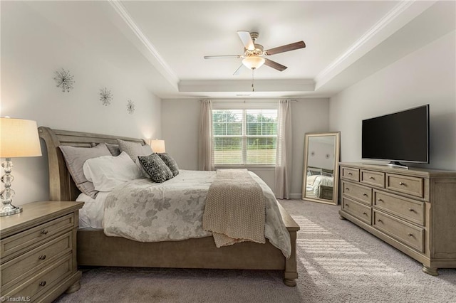 1348 Motsinger Rd, Winston-Salem, NC 27107 - bedroom featuring a ceiling fan, ornamental molding, light carpet, and a tray ceiling