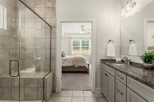 1348 Motsinger Rd, Winston-Salem, NC 27107 - full bath featuring a ceiling fan, tile patterned flooring, a shower stall, vanity, and ensuite bathroom