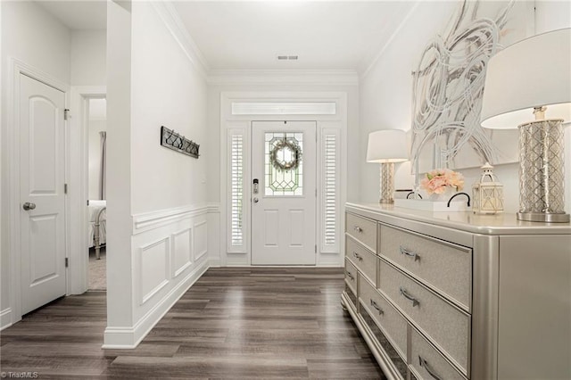 1348 Motsinger Rd, Winston-Salem, NC 27107 - foyer entrance with dark wood-type flooring, ornamental molding, wainscoting, and visible vents