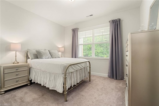 1348 Motsinger Rd, Winston-Salem, NC 27107 - carpeted bedroom with baseboards and visible vents