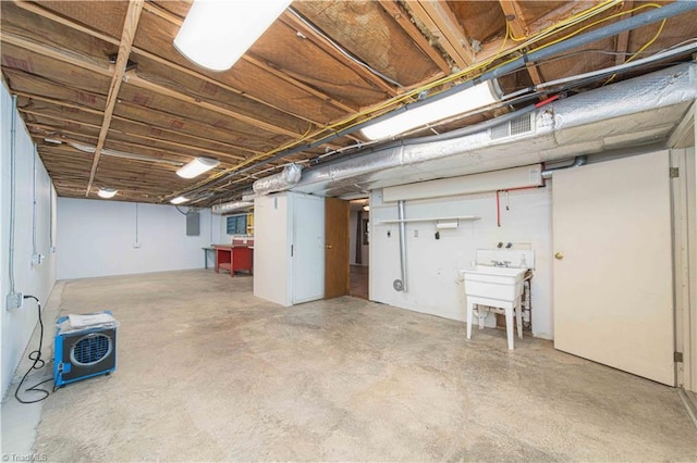 3306 Midkiff Rd, Winston-Salem, NC 27106 - basement featuring a sink
