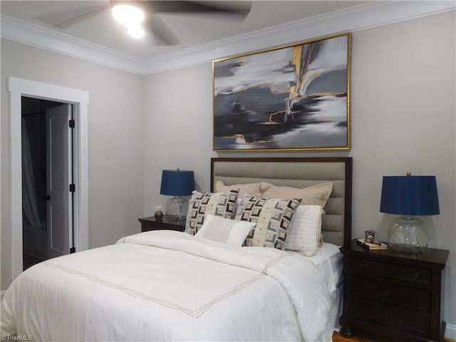 bedroom with a ceiling fan and crown molding