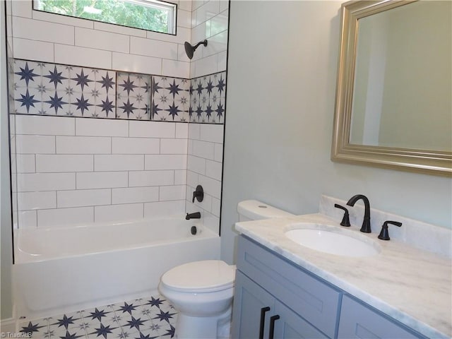 bathroom with vanity, toilet, and shower / bathtub combination