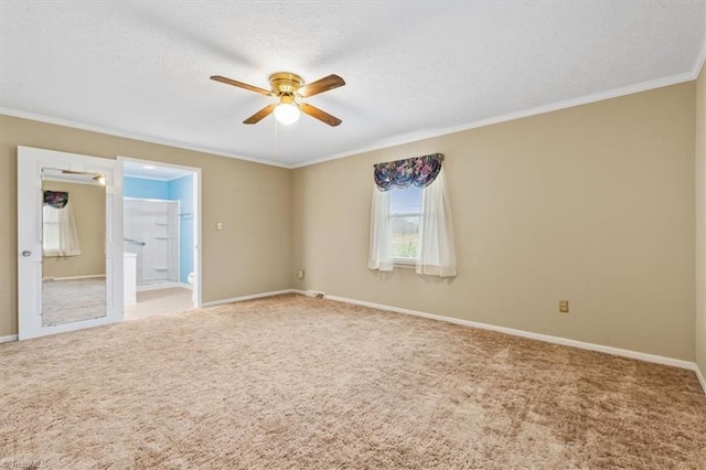 interior space featuring a textured ceiling, ceiling fan, and crown molding