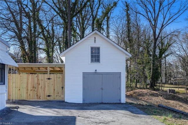 garage featuring a carport