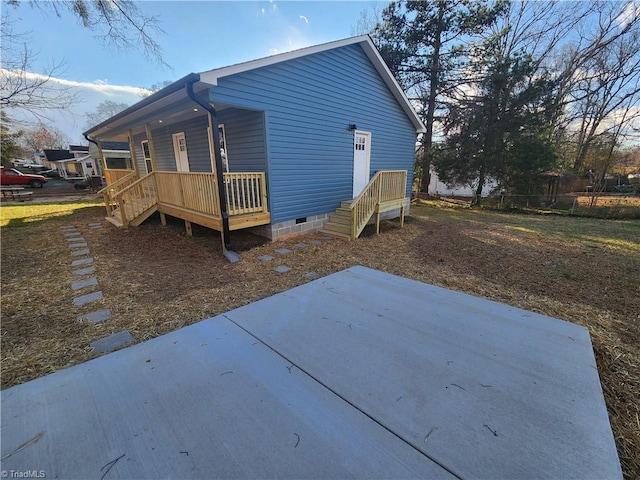 back of property featuring a patio