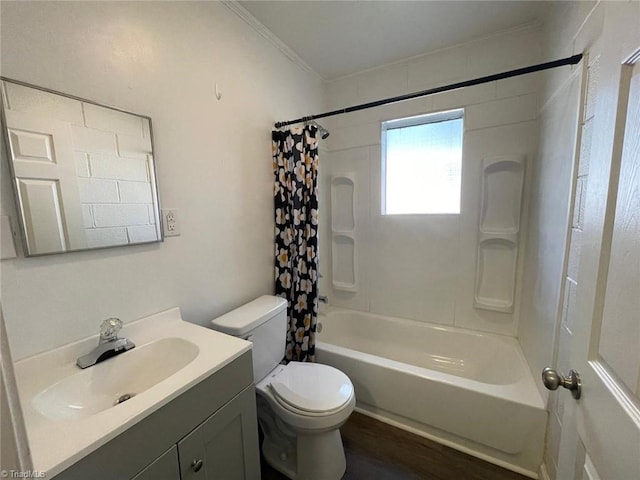 full bathroom featuring vanity, ornamental molding, shower / bathtub combination with curtain, and toilet