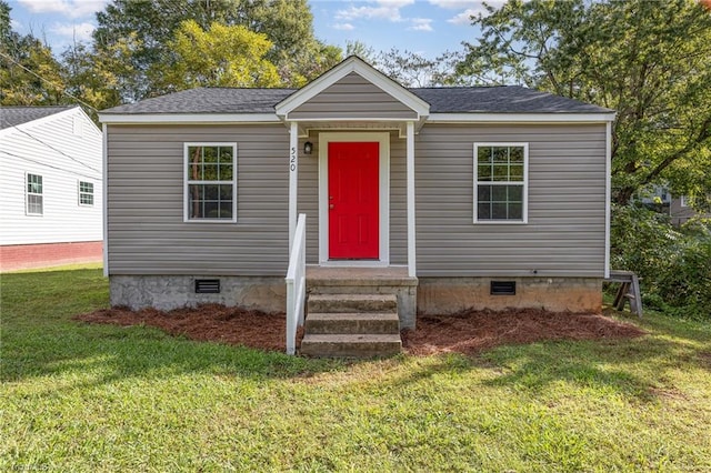 view of front facade featuring a front yard