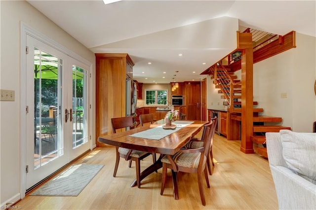 7 Pineburr Ct, Greensboro, NC 27455 - dining room with stairway, light wood finished floors, plenty of natural light, vaulted ceiling, and recessed lighting
