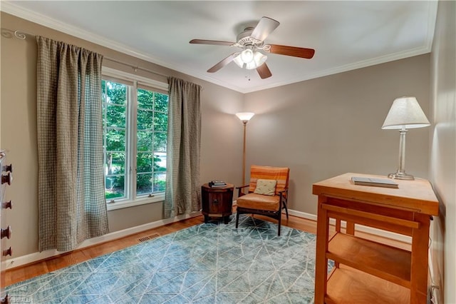 7 Pineburr Ct, Greensboro, NC 27455 - sitting room featuring baseboards, wood finished floors, a ceiling fan, and ornamental molding