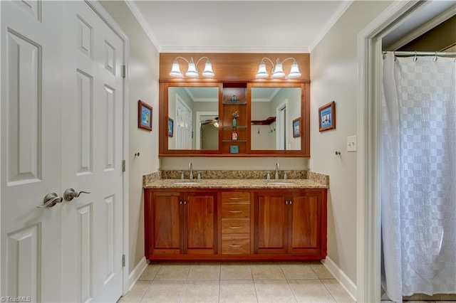 7 Pineburr Ct, Greensboro, NC 27455 - full bath featuring double vanity, baseboards, tile patterned floors, and ornamental molding