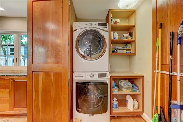 7 Pineburr Ct, Greensboro, NC 27455 - washroom with stacked washer / drying machine and light wood finished floors