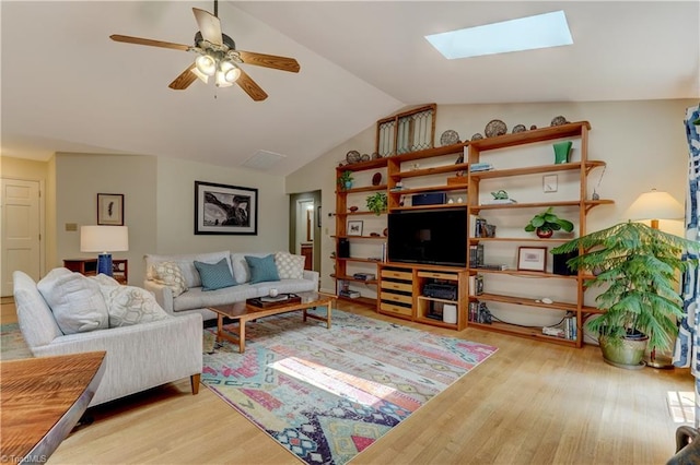 7 Pineburr Ct, Greensboro, NC 27455 - living area featuring wood finished floors, a skylight, lofted ceiling, and a ceiling fan