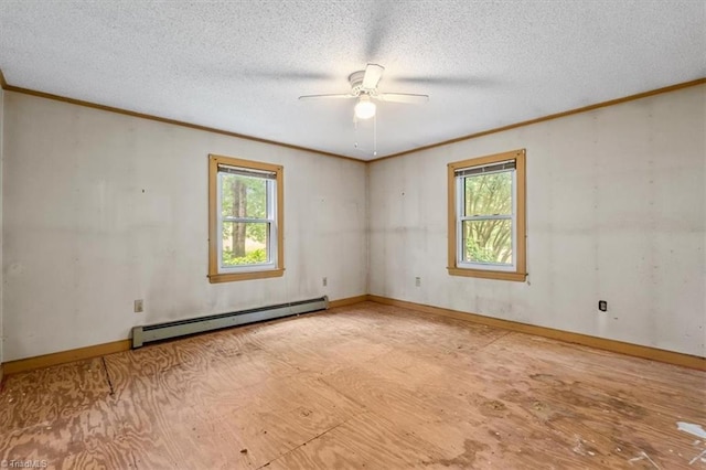 unfurnished room featuring a baseboard heating unit, plenty of natural light, ornamental molding, a ceiling fan, and a textured ceiling