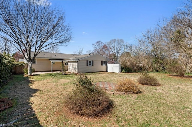 view of yard featuring a patio and fence