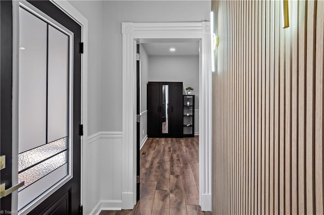 hallway featuring dark wood-style floors