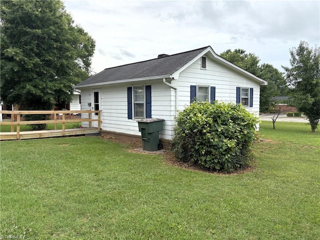 905 W Jefferson St, Mayodan, NC 27027 - view of side of home featuring roof with shingles