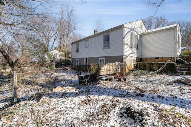 view of snow covered property