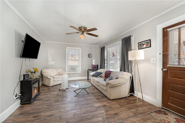 living room featuring crown molding, dark hardwood / wood-style floors, and ceiling fan