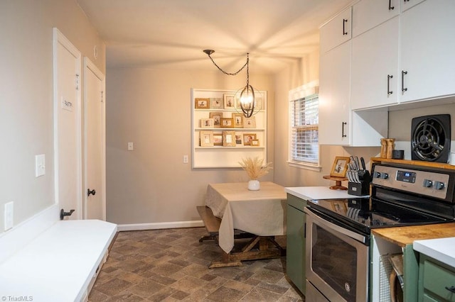 kitchen with hanging light fixtures, a notable chandelier, stainless steel range with electric stovetop, white cabinets, and green cabinetry