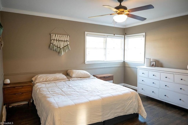 bedroom featuring ceiling fan, dark wood-type flooring, and ornamental molding