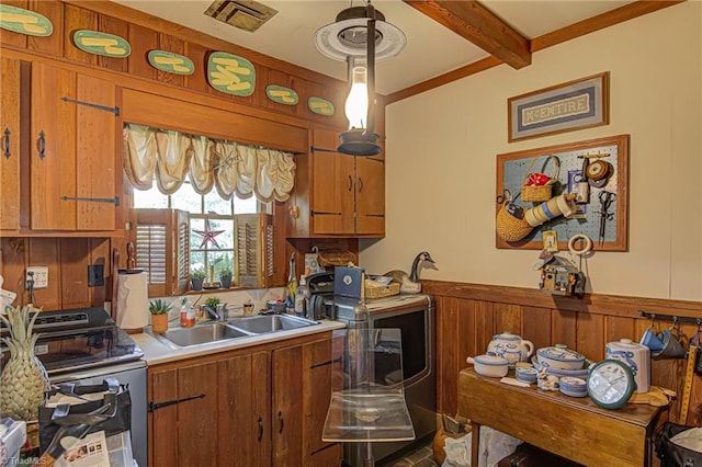 kitchen with stainless steel electric range, hanging light fixtures, sink, beamed ceiling, and wooden walls