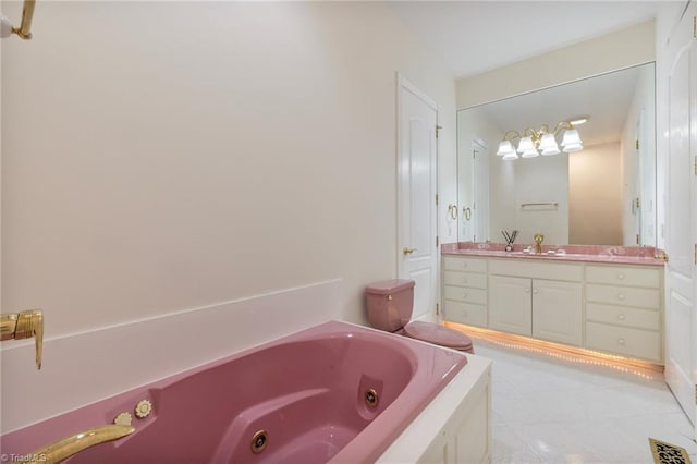 bathroom featuring vanity, tile patterned floors, and a bathing tub