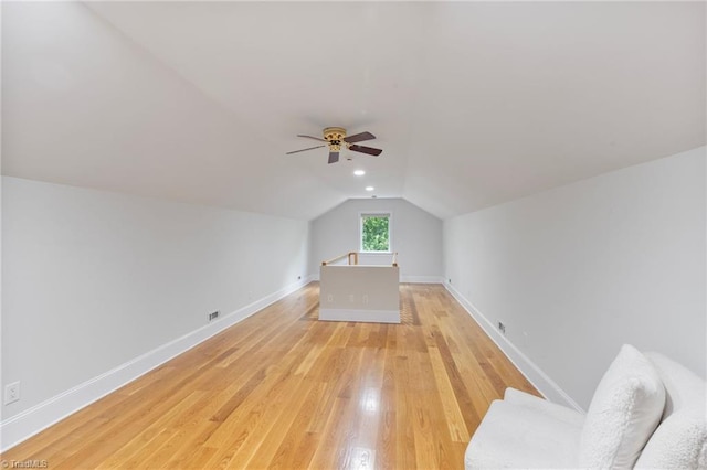 bonus room with ceiling fan, light wood-type flooring, and lofted ceiling