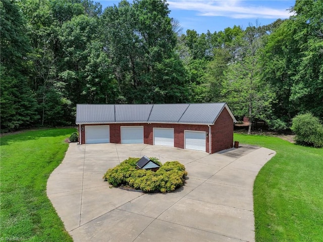 garage with a yard