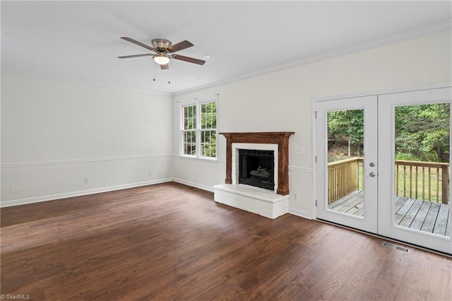 unfurnished living room featuring dark hardwood / wood-style flooring, french doors, and plenty of natural light