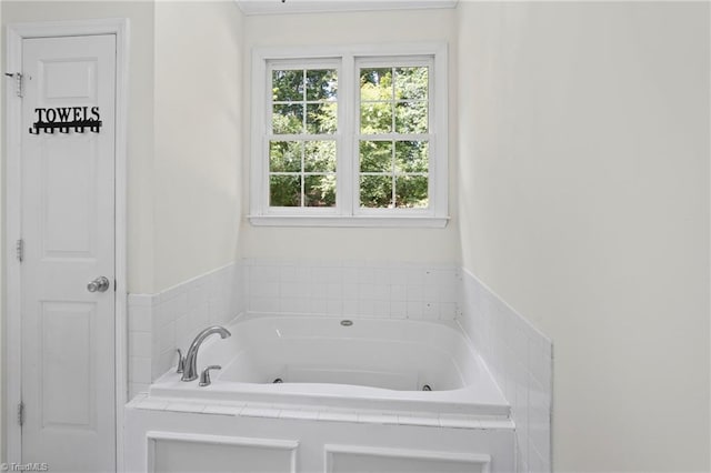 bathroom with a tub