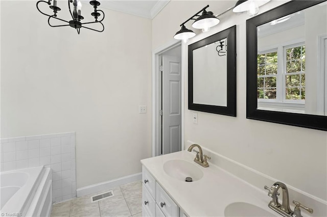 bathroom featuring a bathtub, a chandelier, ornamental molding, vanity, and tile patterned flooring