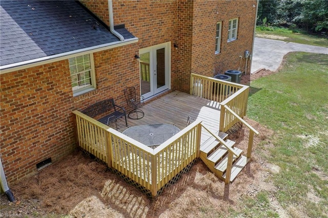 wooden deck with a yard