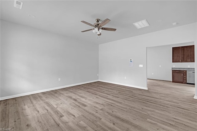 unfurnished living room featuring ceiling fan and light wood-type flooring