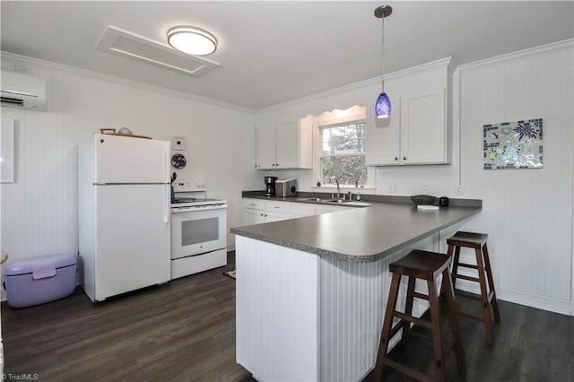 kitchen with ornamental molding, white appliances, dark wood-type flooring, decorative light fixtures, and white cabinetry