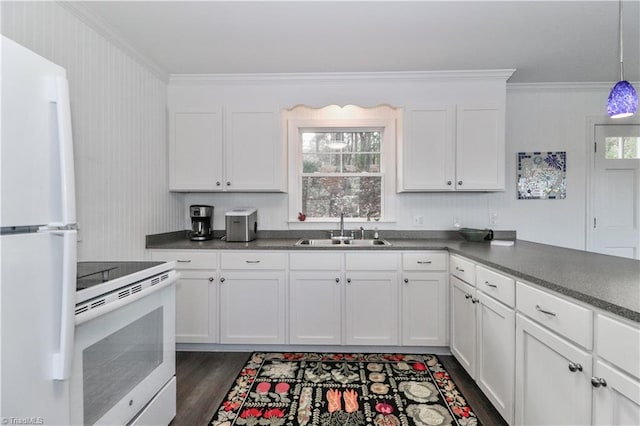 kitchen with white cabinets, white appliances, and sink