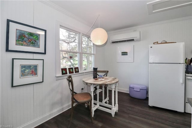 dining area with a wall mounted air conditioner, dark hardwood / wood-style floors, and ornamental molding