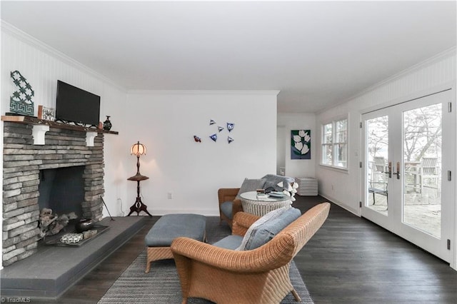 living room with french doors, crown molding, and dark wood-type flooring