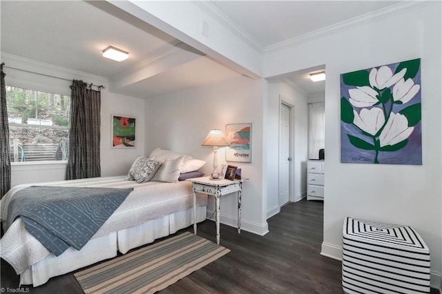 bedroom with dark hardwood / wood-style flooring, ornamental molding, and a closet