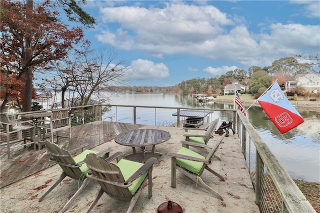 view of patio featuring a water view