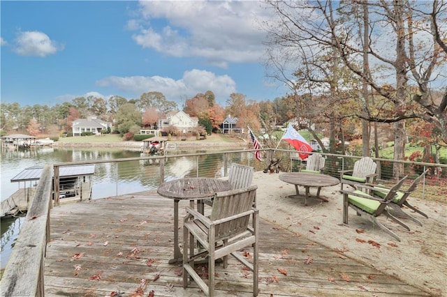 dock area with a water view