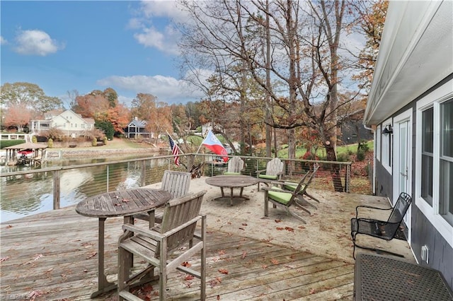 wooden terrace with a water view