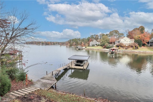 view of dock with a water view