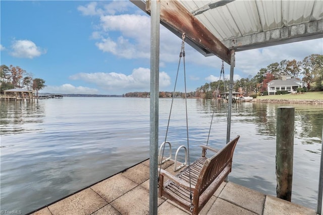 dock area with a water view