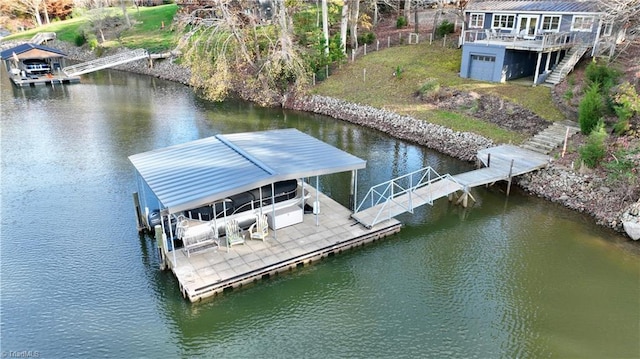 dock area with a water view