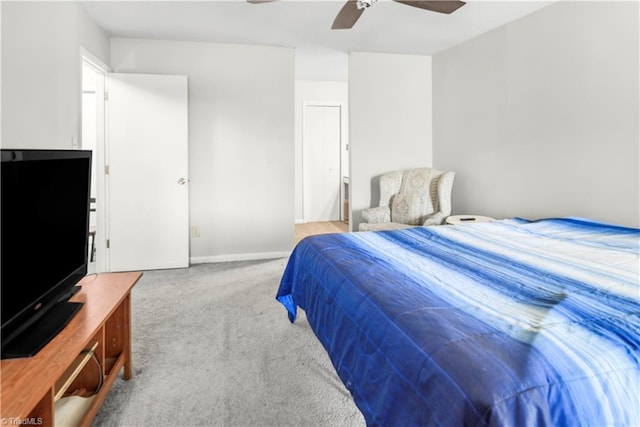 bedroom with ceiling fan and light colored carpet