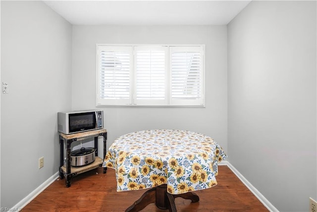 bedroom featuring wood-type flooring