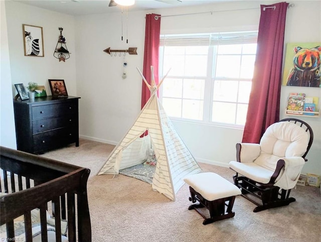 carpeted bedroom featuring baseboards