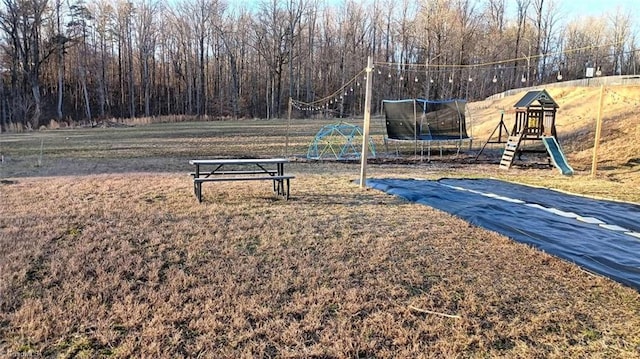 communal playground with a trampoline